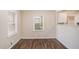 Simple dining area with hardwood floors and neutral walls at 245 Bromack Se Dr, Atlanta, GA 30315