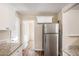 Updated kitchen featuring stainless steel appliances and granite countertops at 245 Bromack Se Dr, Atlanta, GA 30315