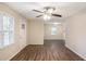 Spacious living area featuring hardwood floors and a ceiling fan at 245 Bromack Se Dr, Atlanta, GA 30315
