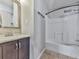 Clean bathroom with tub, shower, and dark vanity at 2538 Gordon Se Cir, Smyrna, GA 30080