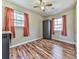 Bright bedroom featuring hardwood floors and ample natural light at 2538 Gordon Se Cir, Smyrna, GA 30080