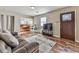 Bright living room featuring hardwood floors and a piano at 2538 Gordon Se Cir, Smyrna, GA 30080