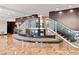 Elegant lobby with a seating area and modern staircase at 3481 Lakeside Ne Dr # 1406, Atlanta, GA 30326