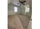 Spacious bedroom with neutral carpeting and a ceiling fan at 3061 Brooks Dr, Snellville, GA 30078