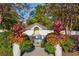 Inviting community pool with lush landscaping and decorative planters at 3101 Howell Mill Nw Rd # 327, Atlanta, GA 30327