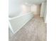 Bright and airy loft with neutral carpeting at 558 Fairview Oak Pl, Dallas, GA 30157