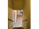 View of stairs leading down to kitchen and hallway at 9074 Homewood Dr, Riverdale, GA 30274