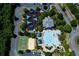 Aerial view of community pool, playground, tennis and basketball courts at 608 Chickory Ct, Woodstock, GA 30188