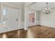 Bright entryway with hardwood floors and wainscoting at 608 Chickory Ct, Woodstock, GA 30188