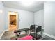 Finished basement with weight bench and exercise equipment at 642 Towering Pine Trl, Lawrenceville, GA 30045