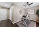 Home office with built-in shelving and hardwood floors at 3263 Dodson Dr, Atlanta, GA 30344