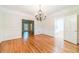 Formal dining room with hardwood floors and chandelier at 1320 Bridgewater Walk, Snellville, GA 30078