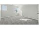 Well-lit bedroom, grey carpet, window with blinds at 208 Paulownia Cir, Mcdonough, GA 30253