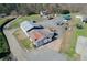 Aerial view of commercial property with building and surrounding land at 1793 Johnson Road, Cumming, GA 30040