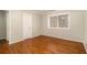 Bedroom with hardwood floors, neutral walls, and closet at 2412 Peachwood Ne Cir # 3, Atlanta, GA 30345