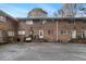 Parking area with multiple units in a brick building at 2412 Peachwood Ne Cir # 3, Atlanta, GA 30345