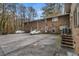 Brick building with parking lot and wooded backdrop at 2412 Peachwood Ne Cir # 3, Atlanta, GA 30345