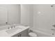 Simple bathroom with white subway tile and a single vanity at 2561 High Brow St # 38, Duluth, GA 30096