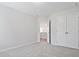 Spacious bedroom with carpet and access to a loft area at 913 Agate Ln, Lawrenceville, GA 30043