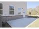 Private patio with brick border, perfect for relaxing at 913 Agate Ln, Lawrenceville, GA 30043