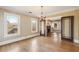 Formal dining room with hardwood floors and access to living room at 1380 Emory Ne Rd, Atlanta, GA 30306