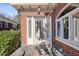 Front entrance with brick accents and a stone walkway at 1380 Emory Ne Rd, Atlanta, GA 30306