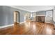 Living room with hardwood floors, fireplace, and built-in shelving at 1380 Emory Ne Rd, Atlanta, GA 30306