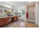 Large bathroom with double vanity, soaking tub, and separate shower at 3547 Valley Bluff Ln, Snellville, GA 30039