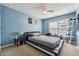 Light and airy bedroom with plush carpeting and window coverings at 3547 Valley Bluff Ln, Snellville, GA 30039