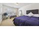 Comfortable bedroom with window coverings and carpeted floors at 3547 Valley Bluff Ln, Snellville, GA 30039