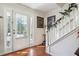Entryway with hardwood floors, staircase and white doors at 3547 Valley Bluff Ln, Snellville, GA 30039