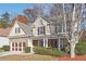 Two-story house with stone accents and a brown-trimmed garage at 3547 Valley Bluff Ln, Snellville, GA 30039