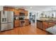 Kitchen with stainless steel appliances and wood cabinets at 3547 Valley Bluff Ln, Snellville, GA 30039