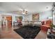 Open living room with hardwood floors and views to kitchen area at 3547 Valley Bluff Ln, Snellville, GA 30039