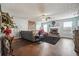 Living room boasts a cozy fireplace and hardwood floors at 3547 Valley Bluff Ln, Snellville, GA 30039