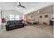 Open main bedroom with sitting area and large windows at 3547 Valley Bluff Ln, Snellville, GA 30039