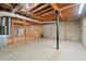 Unfinished basement with high ceilings and potential for expansion at 1448 Gates Mill Walk, Lawrenceville, GA 30045