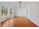 Bright dining room with hardwood floors and large windows at 1448 Gates Mill Walk, Lawrenceville, GA 30045