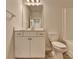 Clean bathroom, featuring a vanity, toilet, and tub at 2908 Rambler Dr, Loganville, GA 30052