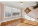 Well-lit bedroom with hardwood floors and a large window at 295 Cherington Ln, Lawrenceville, GA 30044