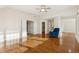 Bedroom with wood floors and access to closet and bath at 295 Cherington Ln, Lawrenceville, GA 30044