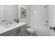 Stylish bathroom featuring white subway tile, gray vanity, and modern fixtures at 2541 High Brow St # 40, Duluth, GA 30096