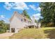 House exterior with attached garage and deck at 58 Greenway Dr, Dallas, GA 30157