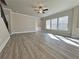 Spacious living room with hardwood floors and lots of natural light at 5465 Rock Place Ct # 41, Norcross, GA 30093