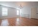 Bright basement room with hardwood floors and chandelier at 1285 E Hwy 5, Carrollton, GA 30116