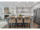 Modern kitchen with island, stainless steel appliances, and pendant lighting at 2521 High Brow St # 42, Duluth, GA 30096