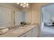 Bathroom with double vanity and granite countertop at 307 Collier Mills Rd, Lawrenceville, GA 30045