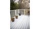 Spacious deck with potted plants and white railing at 118 Waverly Ne Way, Atlanta, GA 30307