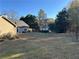 Large backyard with plenty of space for outdoor activities at 350 Chestnut Dr, Covington, GA 30016