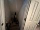 Small basement storage area with vinyl flooring at 350 Chestnut Dr, Covington, GA 30016